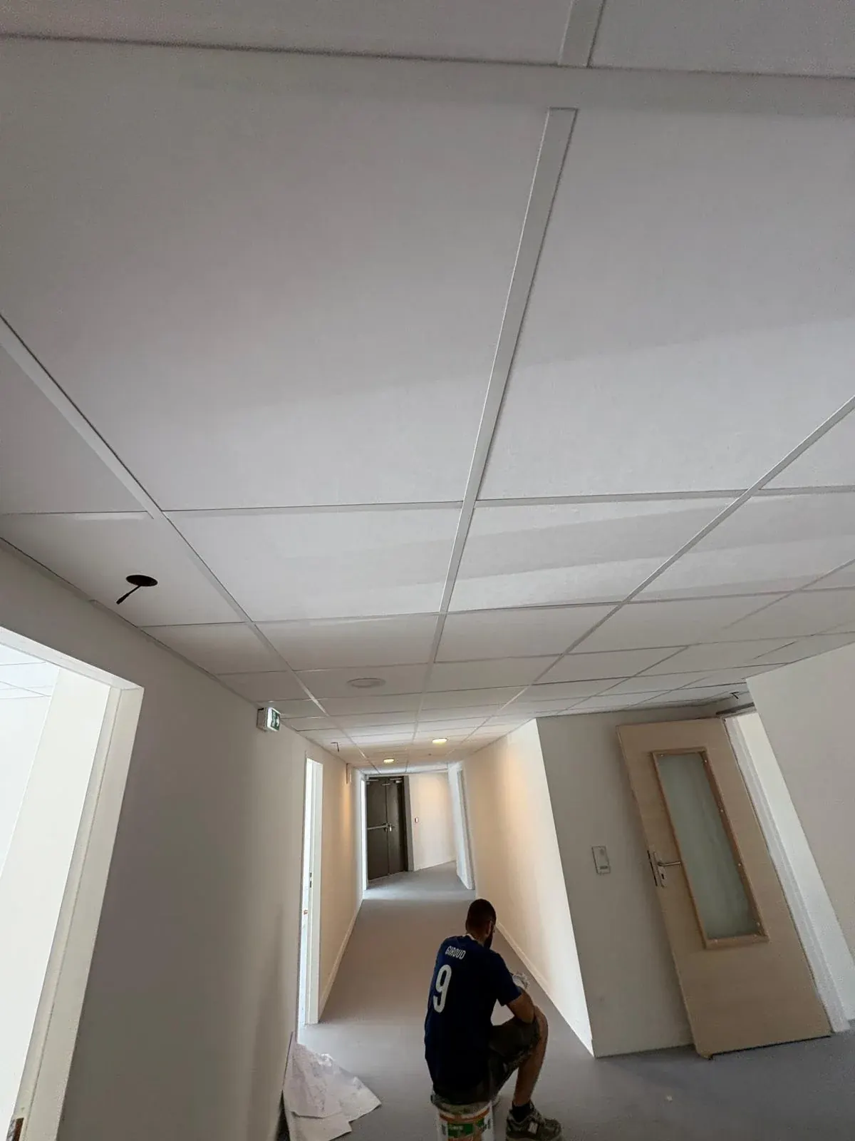 Artisan Andrey Construction en intervention dans un couloir rénové